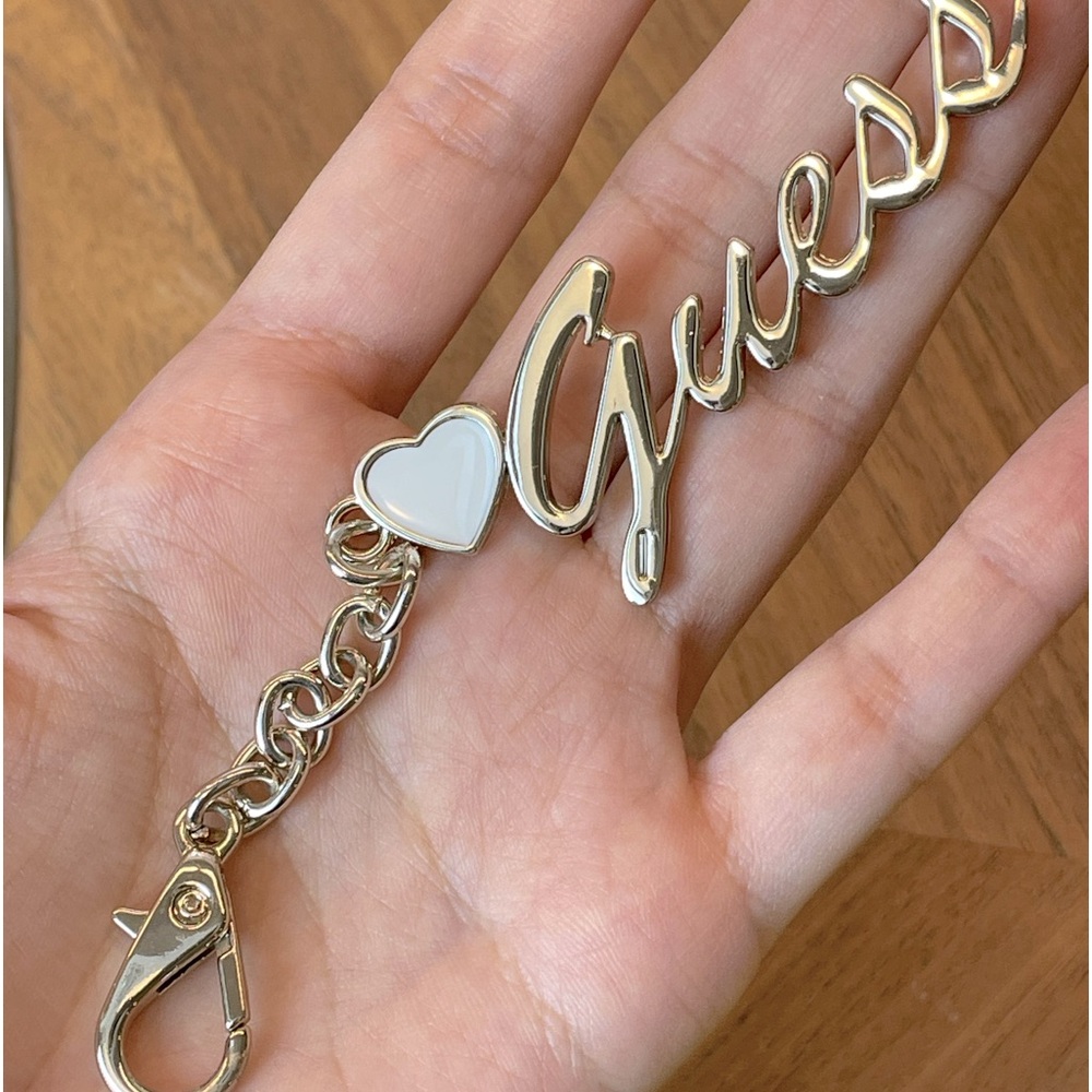 Silver Cursive Guess Key Chain with a White Heart